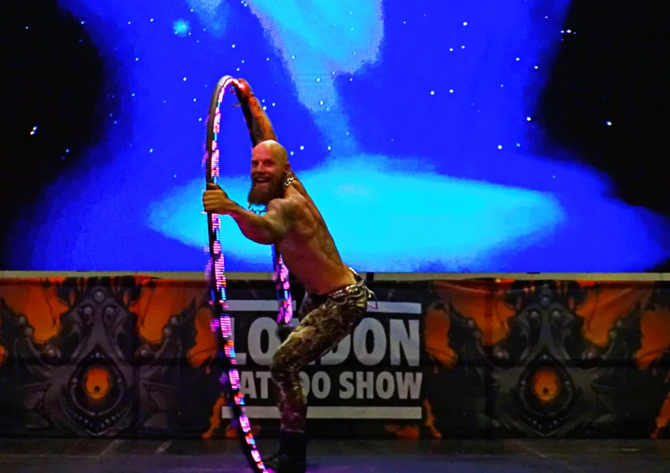 Hoop performance under blue stage lighting