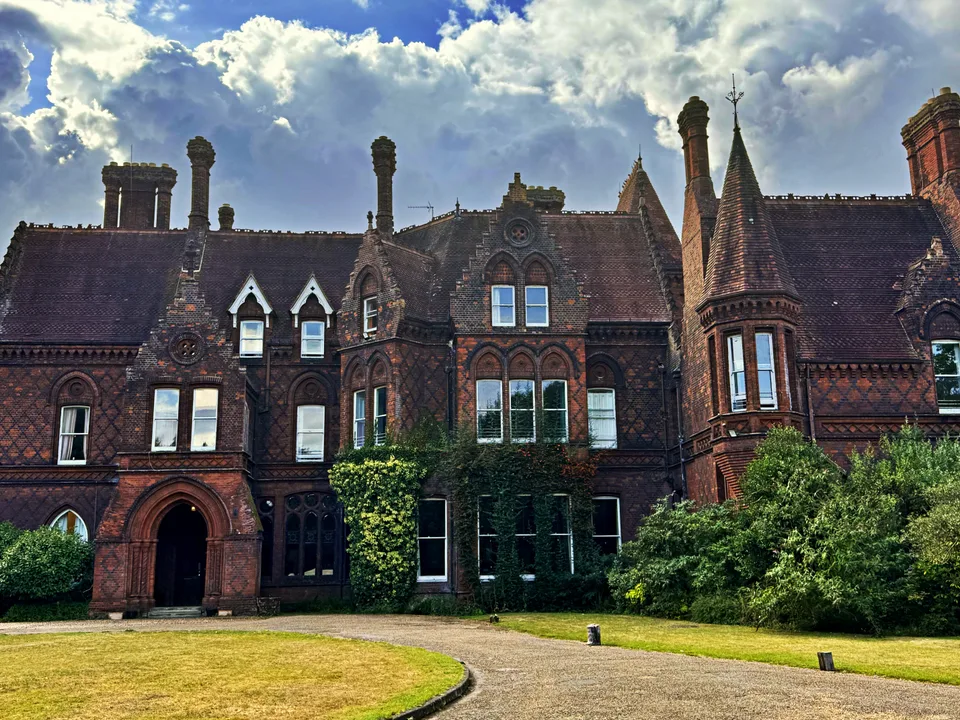 Red brick country house and its lawn