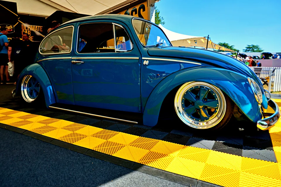 Lowered blue Volkswagen Beetle