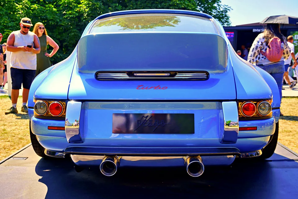 Blue Porsche 911 seen from the rear