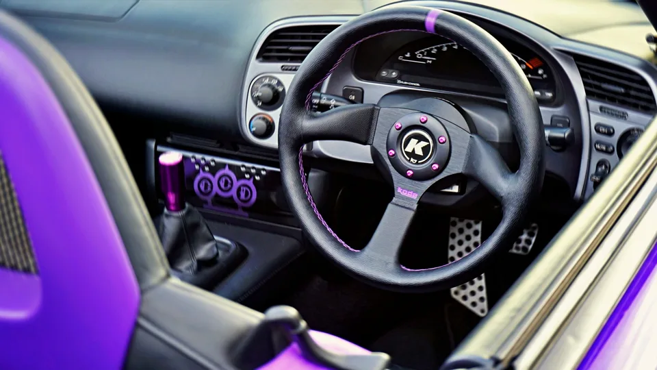 Purple sports car cockpit